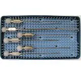 A tray of surgical instruments in a case.