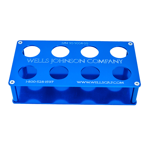 A blue metal box with holes for six different sized cylinders.